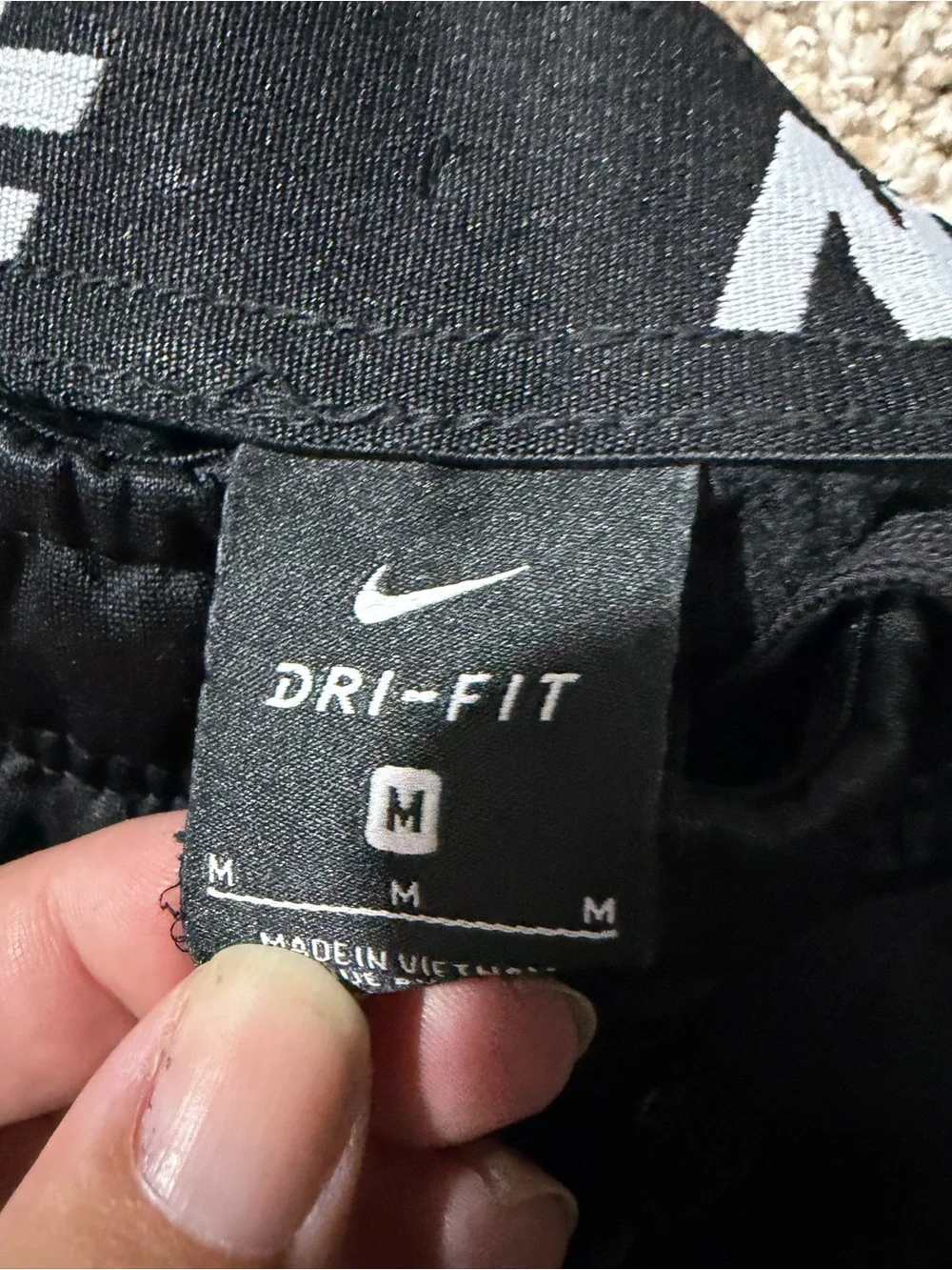 Nike Black Dri-FIT Athletic Pants with White Swoosh Detailing